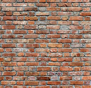 Red Brick wall texture portrait